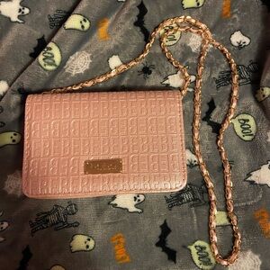 Bebe pink light pink and gold bag